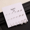 Silver earring set with pearls and studs on white card display - Silver Zircon Pearl Small Heart Earrings (E0231-1)