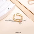 Close-up of 18K gold-plated ring with a square pink zircon on a minimalist background - Pink