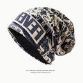 Newspaper print slouchy beanie hat in beige with stylish navy blue artistic lettering - Newspaper Print Style / Navy Blue
