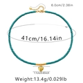Detailed view of turquoise bead necklace with a golden heart pendant and size measurements - Turquoise Beaded Heart Pendant Necklace (KN0106)