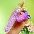 Charming lilac milk tea cup keychain with blue donut charm and Pretty Good strap - 3-Piece Set Milk Tea Cup / Purple