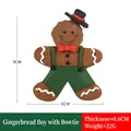 Gingerbread boy Christmas ornament wearing green overalls and top hat 9cm x 6cm - Small Gingerbread Man with Bowtie