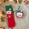 Christmas coral fleece socks with Santa Claus pattern inside a clear gift hanging ornament - Red and Green Santa Claus
