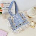 Detailed embroidery of colorful flowers on a blue checkered canvas bag with lace - Blue Gingham