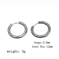 Detail view of silver hammer texture earrings with 2.5mm width and 12mm diameter - Steel Color / Hammered Texture