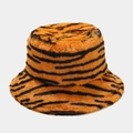 Macro detail of plush faux fur texture on a thick tiger stripe winter bucket hat - M (56-58cm) / Orange