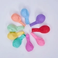 Uninflated colorful latex balloons in a radial arrangement on a white background - 12 Inch 2.8g Macaron Mixed Colors