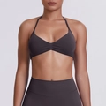 Close-up of seamless dark grey halter sports bra showing high-elasticity fabric detail - Chocolate Brown