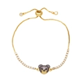 Detailed macro view of 18K gold plated bear charm bracelet with pink and black zircon stones - Pink