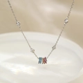Elegant 925 sterling silver geometric necklace featuring five multi-colored gemstone rings - White Gold Plated Copper / Silver