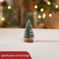 Mini 9cm green frosted Christmas tree with snow tips and a natural round wooden base - Cedar Tree 10CM