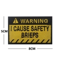 5x8cm square embroidered morale patch with 'WARNING I CAUSE SAFETY BRIEFS' text - WARNING I CAUSE SAFETY BRIEFS / Black & Yellow