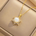 18K gold snowflake necklace with mermaid pearl and cubic zirconia in a jewelry box - Gold