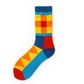 Calze colorate con motivi geometrici e un vivace design patchwork arancione e rosso - Plaid