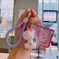 Porte-clés licorne violette avec anneau en corde tressée et breloque en résine blanche - Violet