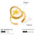Detail view of gold stainless steel ring with real yellow dried flower in oval resin - Yellow Irregular Geometric Dried Flower Style (NB-R24435-YL)