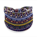Elastic wide headband featuring colorful African tribal patterns and knotted bohemian style - Style 77
