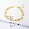 Detail of 18K gold-plated rose chain bracelet with Virgin Mary Guadalupe enamel charm - White Enamel Rose Chain Guadalupe Medal Bracelet