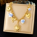 Detail of gold chain bracelet with ceramic floral charms and sun pendants on a display - Gold Pendant Necklace(N3646)