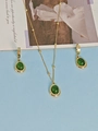 Golden beaded necklace and matching earrings set with elegant green oval pendants - Green