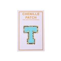 Macro detail of sky blue chenille letter T patch with gold glitter borders and adhesive back - Light Blue Letter T