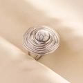Detailed macro view of vintage silver ring with textured ripples and white marble stone - Silver Base-White Pattern Stone