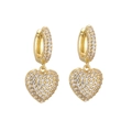 Sparkling gold heart pendant hoop earrings with pave set zircon stones on white background - Earrings / Gold