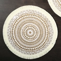 Round jute placemat with white mandala pattern and fringe trim on dark wood - 38cm / Fringed Sunflower