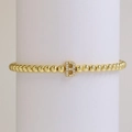 Gold beaded stretch bracelet with micro-pave letter B charm and 18k plating - Letter B