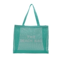 Teal mesh beach tote bag featuring large white 'THE BEACH BAG' text on white background - Lake Blue With White Lettering
