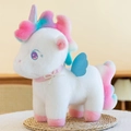 White unicorn plush toy with colorful mane, blue glittery wings, and pink pearl collar - White / 25cm