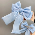 Light blue triple-layer bow hair clip with long ribbons and satin pearlescent finish - Sky Blue Duckbill Clip