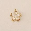 Macro shot of 18K gold flower pendant with pear-shaped zircon stones and heart cutouts - PJ0175-Gold (Heart Hollow Flower)