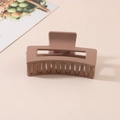 Brown rectangular matte plastic hair claw clip with cutout design on a beige surface - #22 Matte Rust Red - 8.5cm / Bulk (No Packaging)