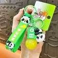 Cute green panda glowing keychain featuring a light-up bulb and soft rubber strap - Panda Tape Light Bulb Charm / Green