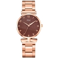 Detail of rose gold ladies watch featuring a dark brown sunburst petal textured dial - Watch (Single Item) / Brown