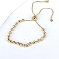 Adjustable minimalist gold beaded bolo bracelet with smooth round beads and sliding clasp - 4mm Gold Color
