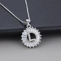 Silver letter L necklace with cubic zirconia micro-pave in a circular pendant charm - Letter L / Silver