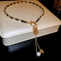 Elegant gold chain leather pearl necklace with OT clasp and Ori engraved tag on a box - Gold (Black Leather Woven)