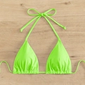 Detail of neon green halter bikini top with ruched triangle cups on wooden background - Fluorescent Green