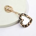 Llavero espejo de corazón con estampado de leopardo en cuero PU y anillo de metal dorado - Leopardo Clásico