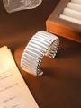 Polished silver textured cuff bracelet with a modern ribbed design and open-end style - L158 Silver Wide Irregular Wave Open