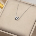 Minimalist silver butterfly pendant necklace with black enamel inlay on jewelry box - Silver Black
