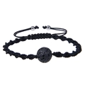 Adjustable woven black rope bracelet featuring a textured natural lava stone bead - Lava Rock Bracelet