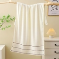 Plush white cotton bath towel with brown stripe detail hanging on a wooden branch - Luxury Cotton Bath Towel (White) / 70*140cm