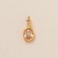 Detailed view of an oval champagne gemstone pendant in a gold-tone flower necklace setting - Oval April (Champagne Zirconia)