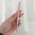 Dual-ended pink makeup brush with flat and pointed heads on a matte handle - Pink Concealer Brush (No Logo)