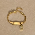 Golden stainless steel Cuban chain ID bracelet with a sparkling rhinestone letter E pendant - Gold Letter E