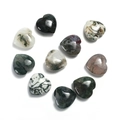 Close-up of ten polished 20mm heart-shaped natural gemstones on white background - Moss Agate