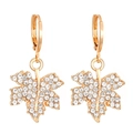 Close-up of gold maple leaf earrings with sparkling cubic zirconia pavé detailing - Gold Maple Leaf Hoop Earrings (DZ-269)